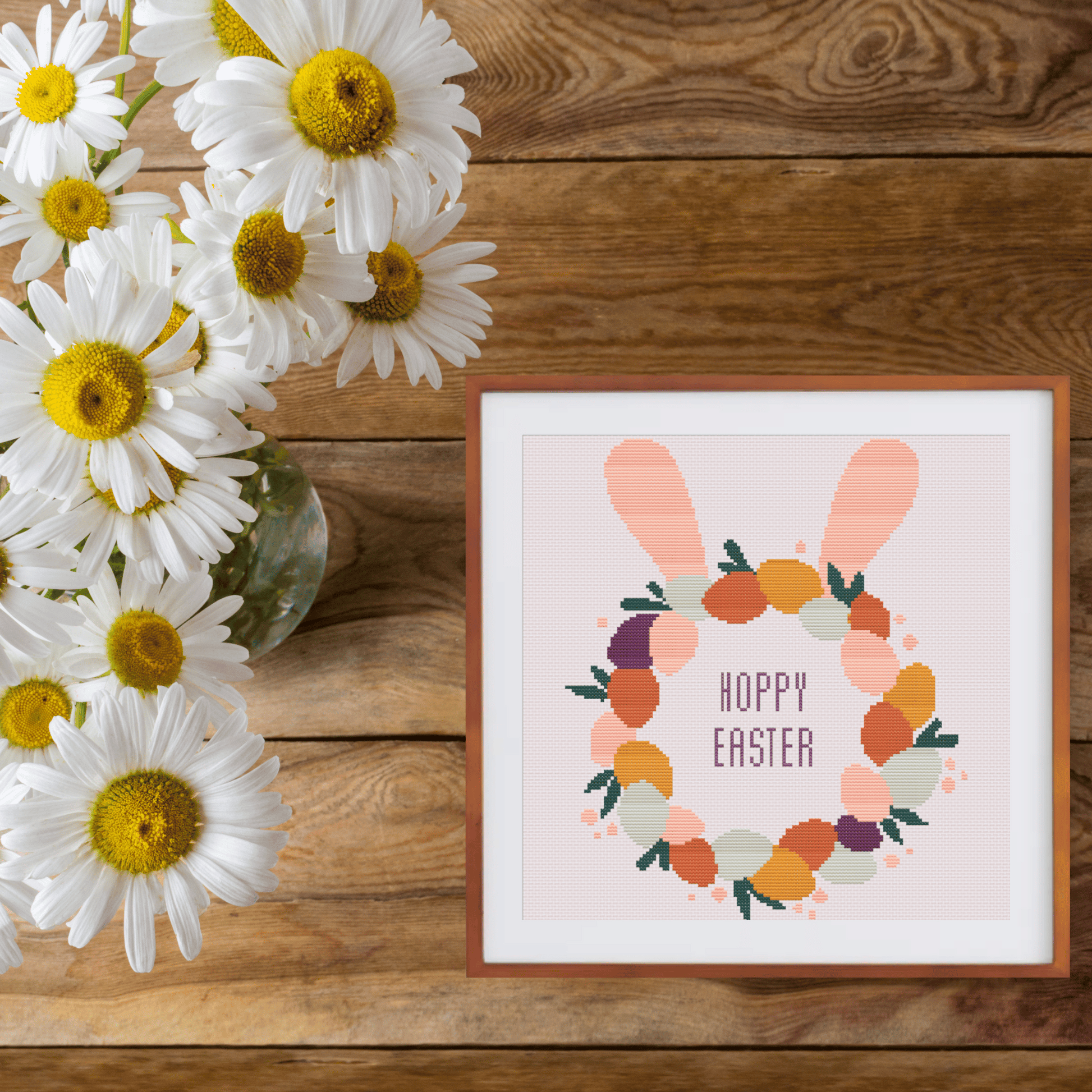 Lovely Modern alphabet cross-stitch pattern. Small elongated cross stitch chart font, including letters, numbers, and symbols.