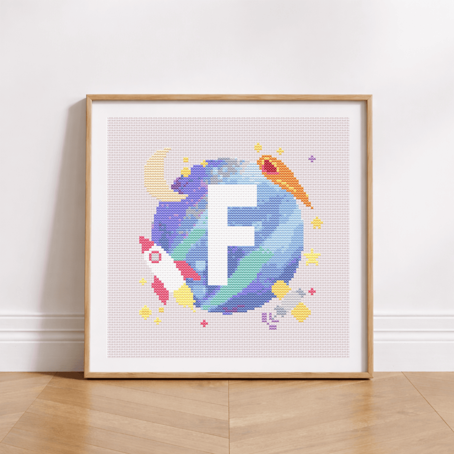 Вензель с космическим фоном