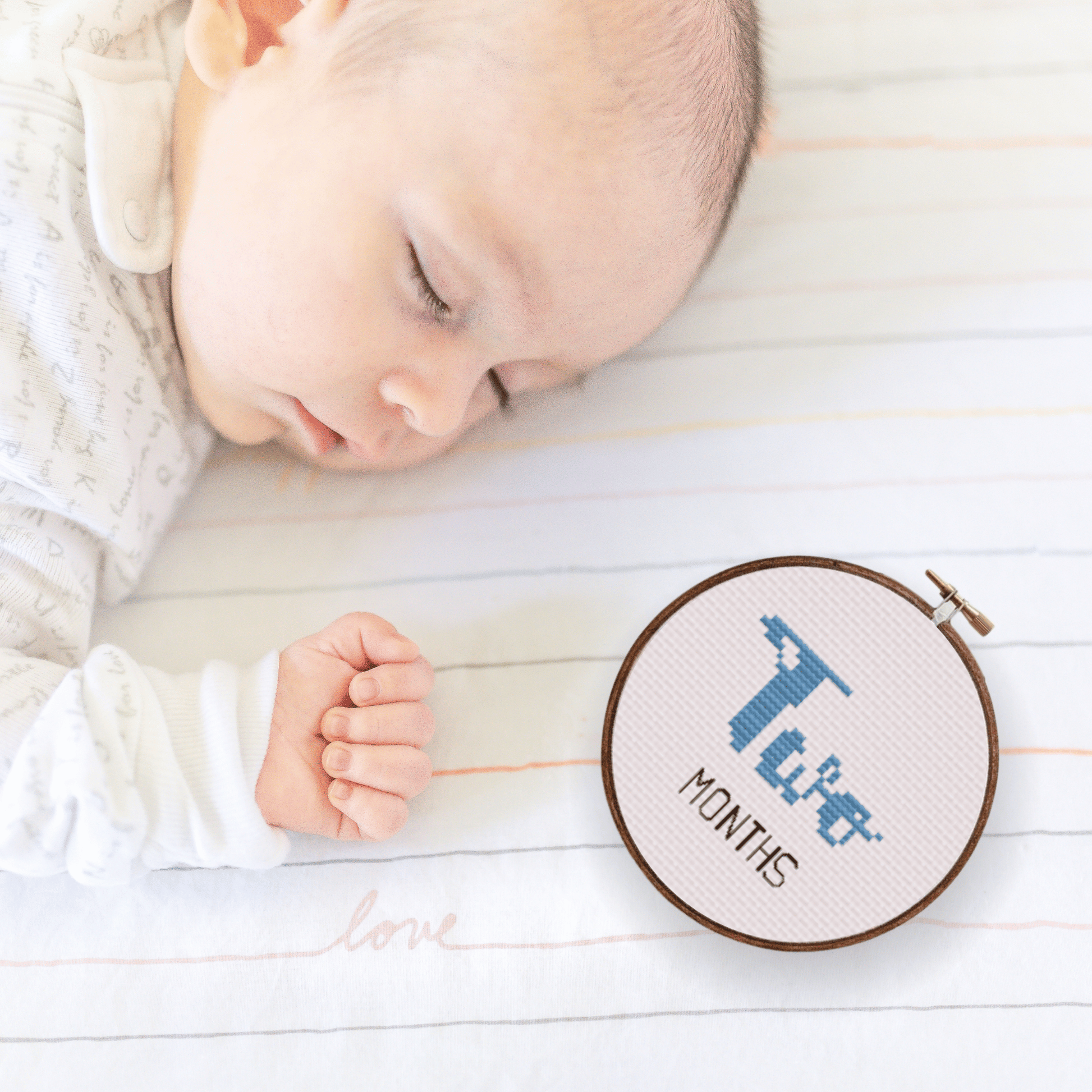 Baby month signs cross-stitch pattern, with twelve months. Ideal handmade gift for a newborn or baby shower!