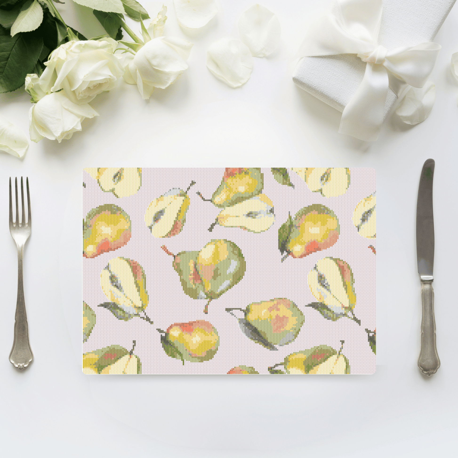 Watercolor pears cross-stitch pattern, perfect to frame or to use as a table mat. Make your own table mat in cross stitch by downloading this pattern.