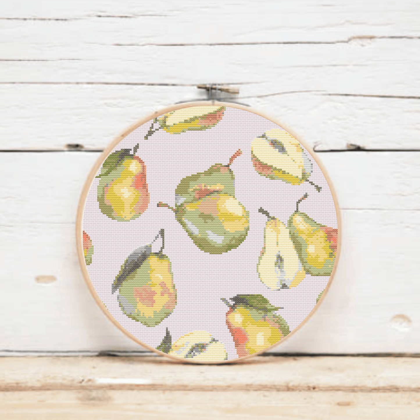 Watercolor pears cross-stitch pattern, perfect to frame or to use as a table mat. Make your own table mat in cross stitch by downloading this pattern.